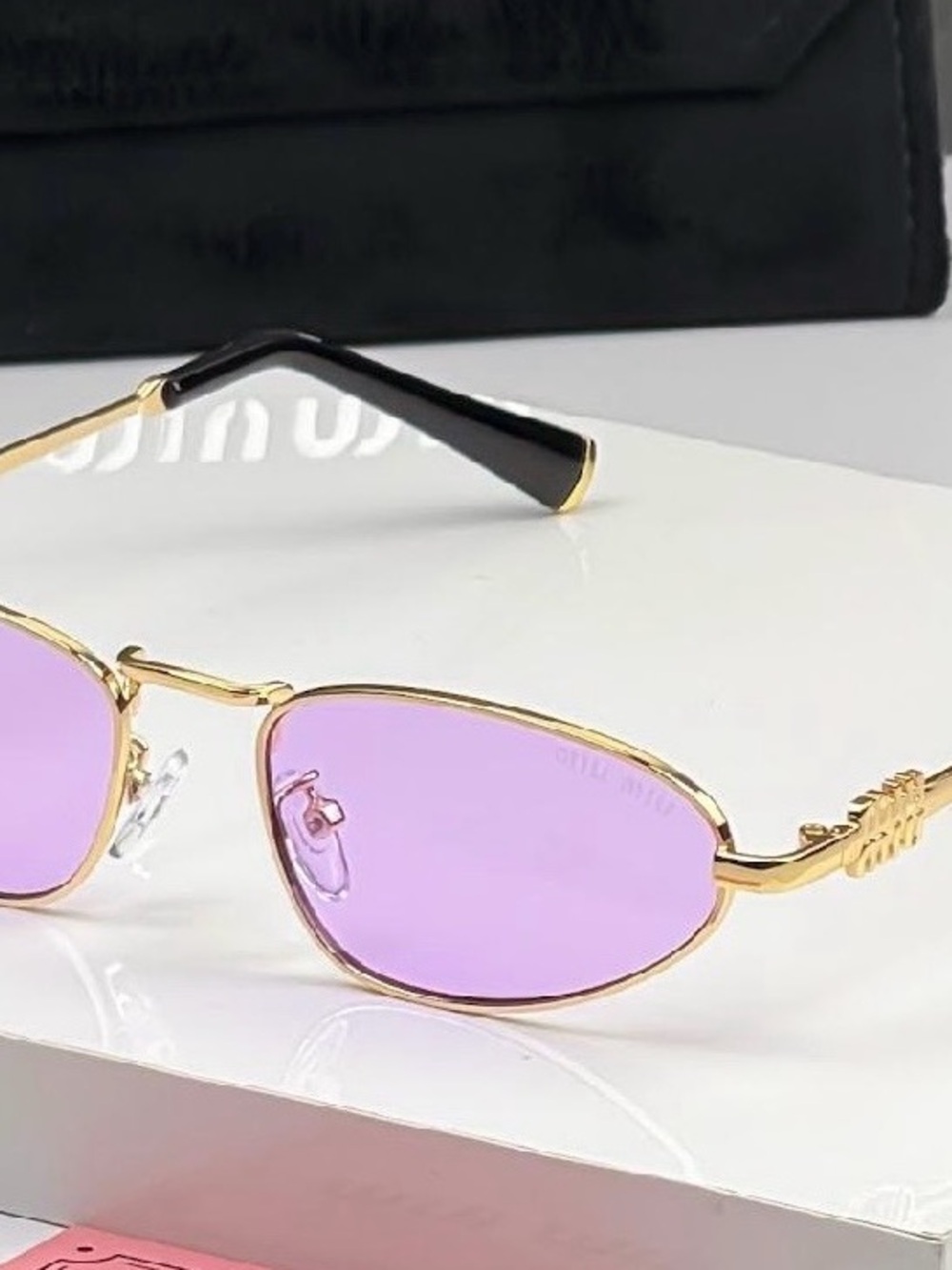 Miu Miu Gold Frame Sunglasses with Lilac Lenses